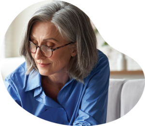 Medicare image of a woman filling out paperwork